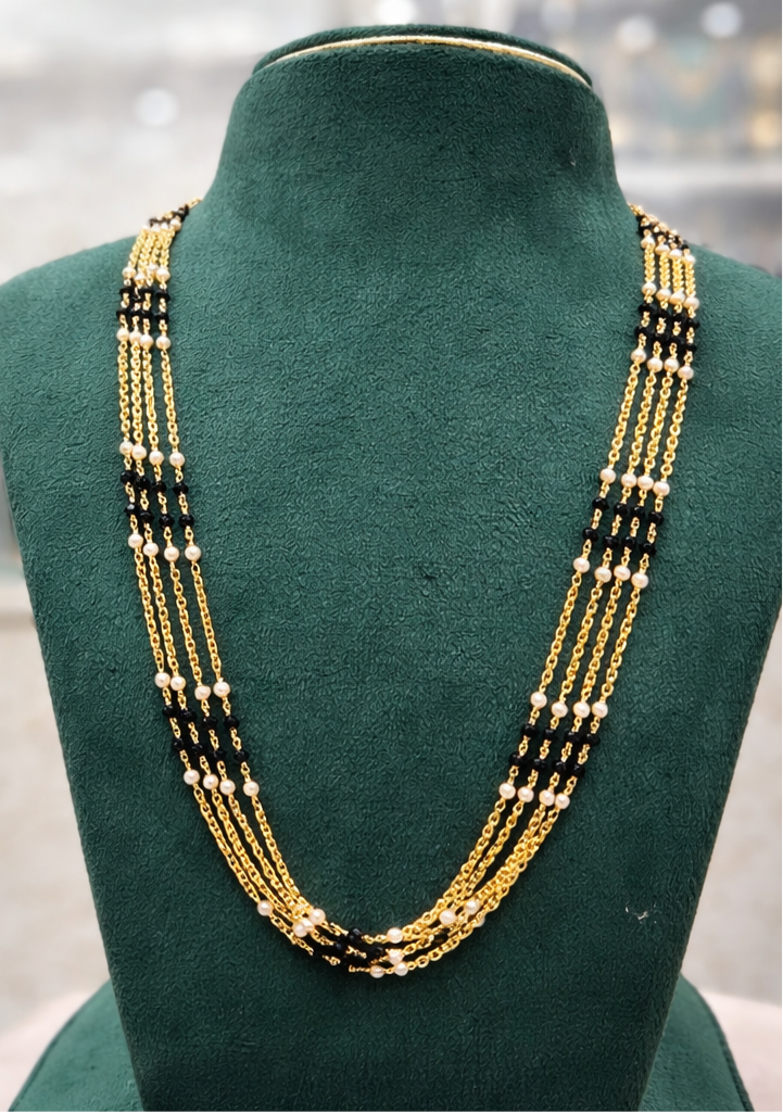 Black nd pearls chandra haram length 24 inches